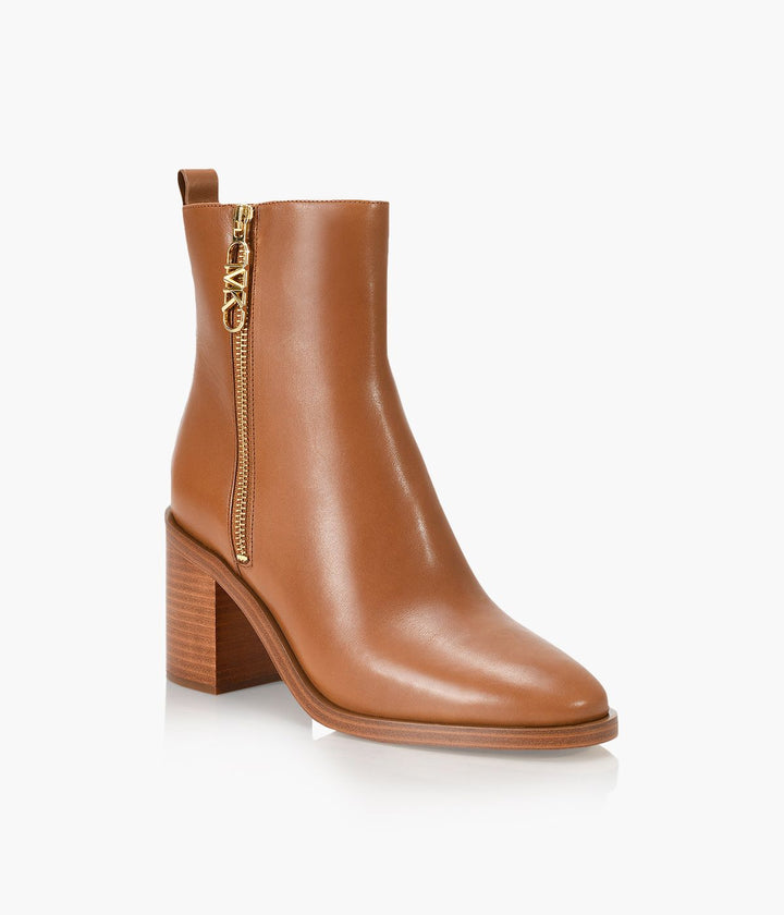  Front of Michael Kors Regan Mid Luggage Bootie - Omars Shoes