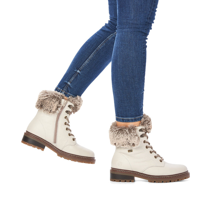 Remonte D0B74-80 White Winter Boot With Medium Washed Jeans Available at Omars Shoes, Aurora, Newmarket Ontario Canada 