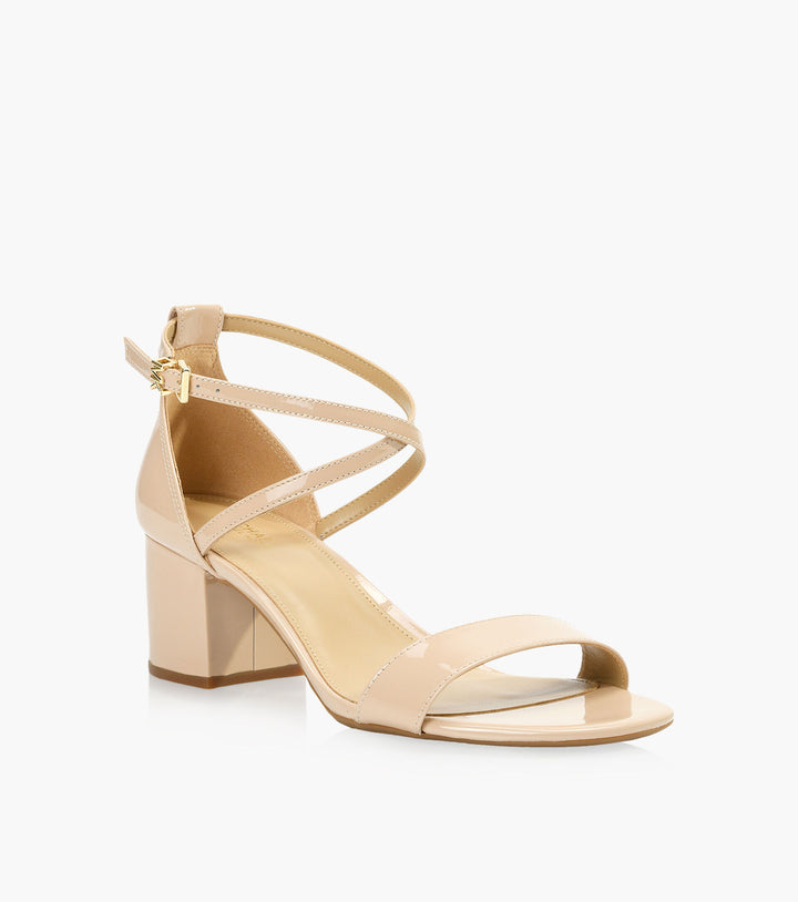 Front angled view of Women's Michael Kors Serena Light Blush Sandal - Omars Shoes