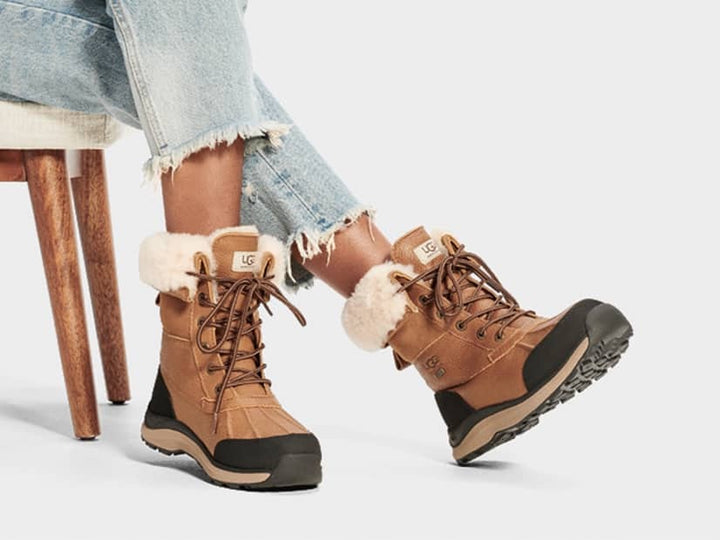 View of Adirondack Chestnut UGG Winter Boot paired with Jeans - Available at Omars Shoes, Aurora, Newmarket Ontario Canada 